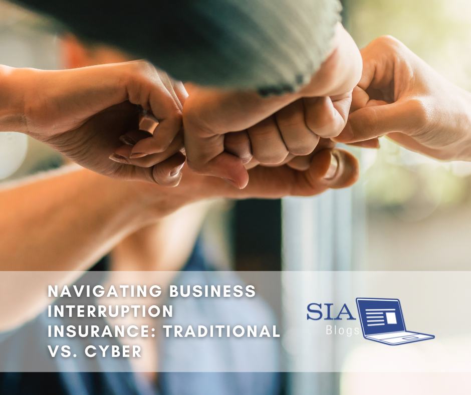 A group of people brings their fists together in a show of unity and teamwork. The caption reads, "Navigating Business Interruption Insurance: Traditional vs. Cyber," along with the SIA Blogs logo.