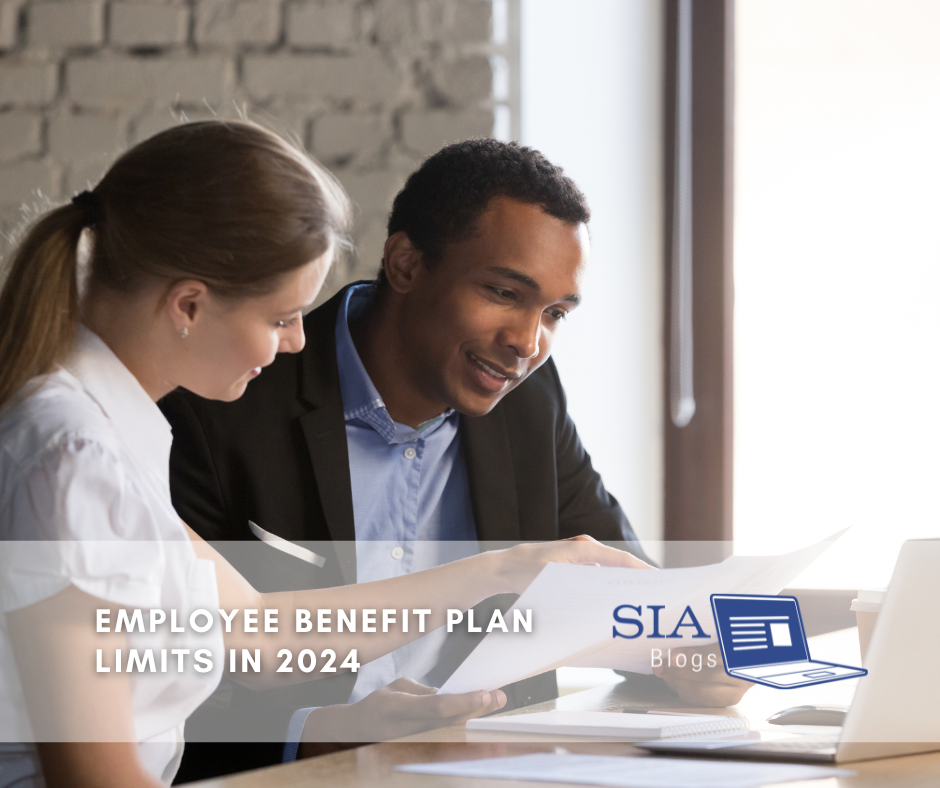 A man and a woman are seated at a desk, reviewing documents together with smiles, appearing engaged in a discussion. The caption reads, "Employee Benefit Plan Limits in 2024," along with the SIA Blogs logo.