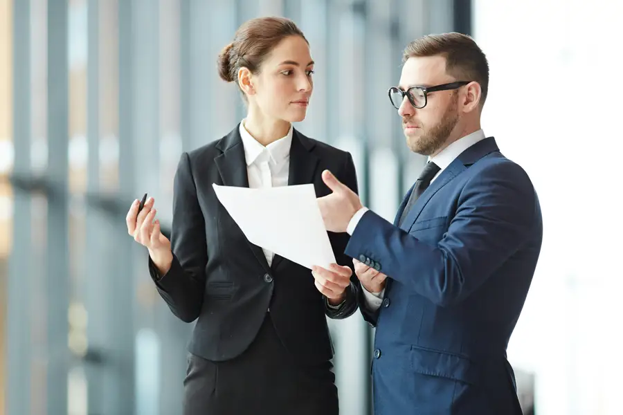 Business man and woman talking